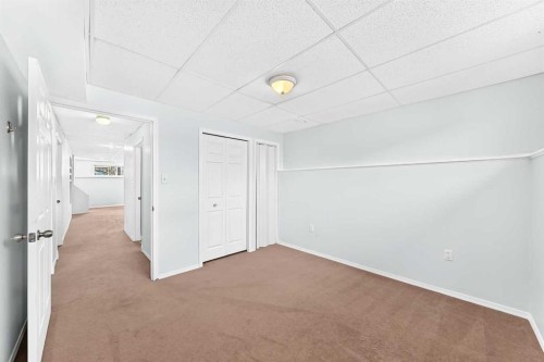 76 Coville Close Ne, Calgary, AB - Indoor Photo Showing Other Room