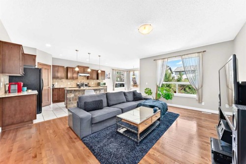 182 Cranfield Manor Se, Calgary, AB - Indoor Photo Showing Living Room