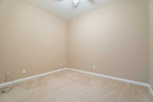 215-43 Sunrise Loop Se, High River, AB - Indoor Photo Showing Other Room