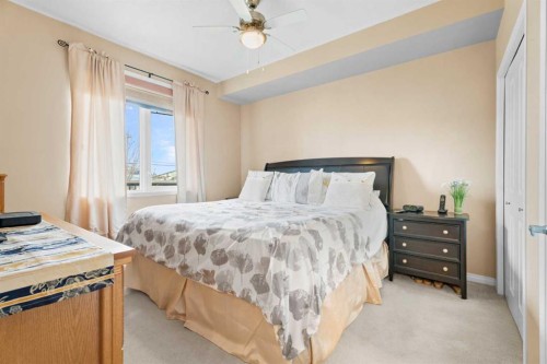 215-43 Sunrise Loop Se, High River, AB - Indoor Photo Showing Bedroom