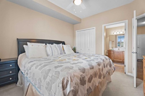215-43 Sunrise Loop Se, High River, AB - Indoor Photo Showing Bedroom