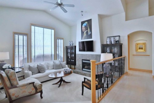 92 Sherwood Rise Nw, Calgary, AB - Indoor Photo Showing Living Room With Fireplace