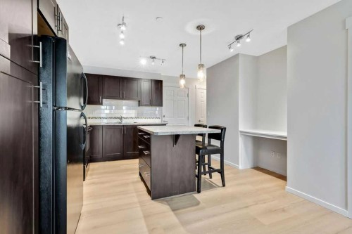 1315-755 Copperpond Boulevard Se, Calgary, AB - Indoor Photo Showing Kitchen With Upgraded Kitchen