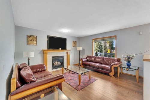 185 West Lakeview Drive, Chestermere, AB - Indoor Photo Showing Living Room With Fireplace