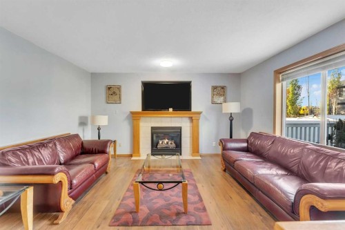 185 West Lakeview Drive, Chestermere, AB - Indoor Photo Showing Living Room With Fireplace