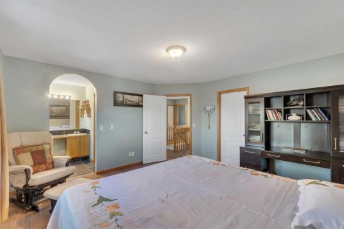 185 West Lakeview Drive, Chestermere, AB - Indoor Photo Showing Bedroom