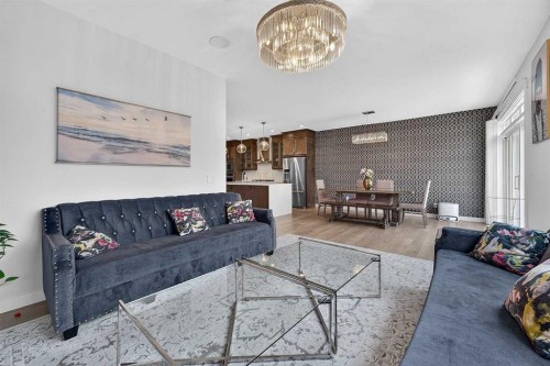 2177 Ravensdun Crescent Se, Airdrie, AB - Indoor Photo Showing Living Room