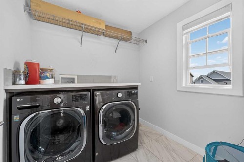 2177 Ravensdun Crescent Se, Airdrie, AB - Indoor Photo Showing Laundry Room