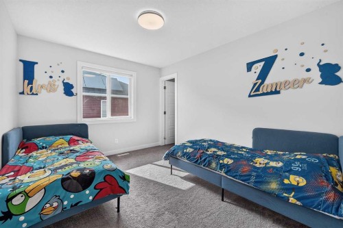 2177 Ravensdun Crescent Se, Airdrie, AB - Indoor Photo Showing Bedroom