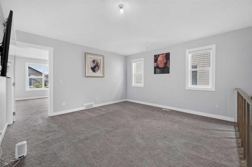 2177 Ravensdun Crescent Se, Airdrie, AB - Indoor Photo Showing Other Room
