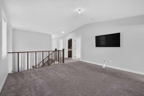 2177 Ravensdun Crescent Se, Airdrie, AB - Indoor Photo Showing Other Room