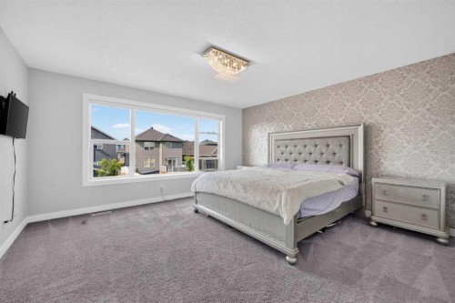 2177 Ravensdun Crescent Se, Airdrie, AB - Indoor Photo Showing Bedroom
