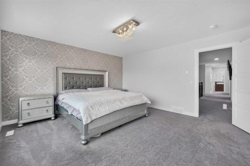 2177 Ravensdun Crescent Se, Airdrie, AB - Indoor Photo Showing Bedroom