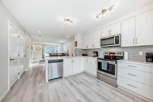 128-31 Red Embers Parade Ne, Calgary, AB - Indoor Photo Showing Kitchen With Stainless Steel Kitchen