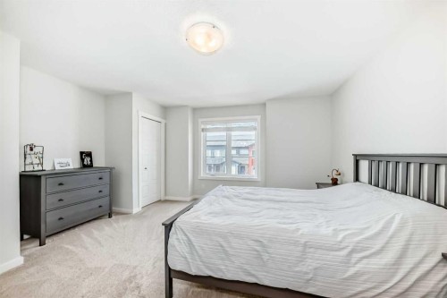 128-31 Red Embers Parade Ne, Calgary, AB - Indoor Photo Showing Bedroom