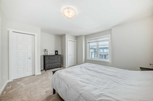128-31 Red Embers Parade Ne, Calgary, AB - Indoor Photo Showing Bedroom