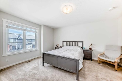 128-31 Red Embers Parade Ne, Calgary, AB - Indoor Photo Showing Bedroom