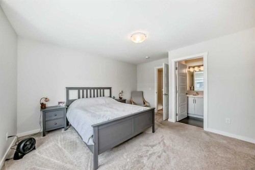 128-31 Red Embers Parade Ne, Calgary, AB - Indoor Photo Showing Bedroom