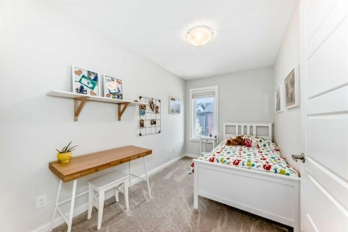 128-31 Red Embers Parade Ne, Calgary, AB - Indoor Photo Showing Bedroom