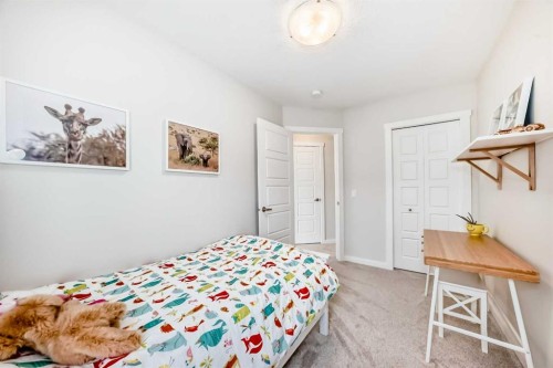 128-31 Red Embers Parade Ne, Calgary, AB - Indoor Photo Showing Bedroom