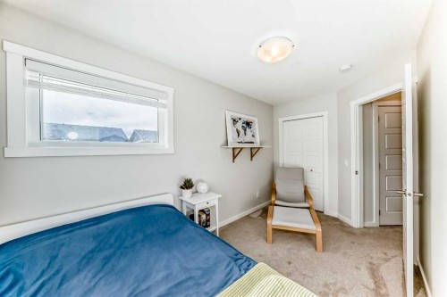 128-31 Red Embers Parade Ne, Calgary, AB - Indoor Photo Showing Bedroom