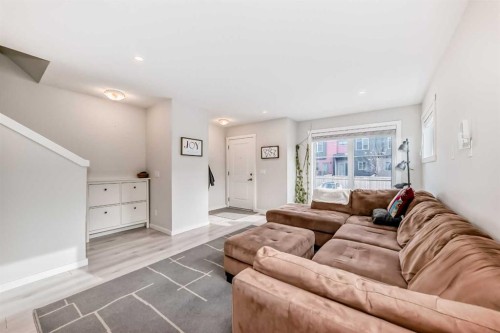 128-31 Red Embers Parade Ne, Calgary, AB - Indoor Photo Showing Living Room
