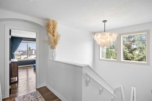 31 Crestridge Way Sw, Calgary, AB - Indoor Photo Showing Other Room