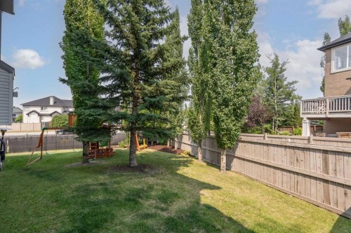 31 Crestridge Way Sw, Calgary, AB - Outdoor With Backyard