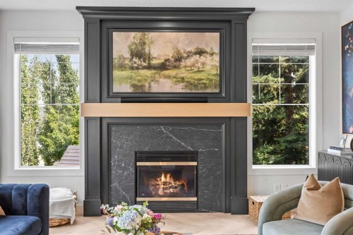 31 Crestridge Way Sw, Calgary, AB - Indoor Photo Showing Living Room With Fireplace