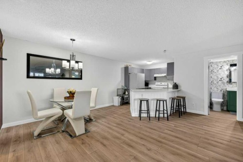 2207-12 Cimarron Common, Okotoks, AB - Indoor Photo Showing Dining Room