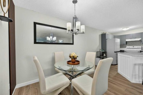 2207-12 Cimarron Common, Okotoks, AB - Indoor Photo Showing Dining Room