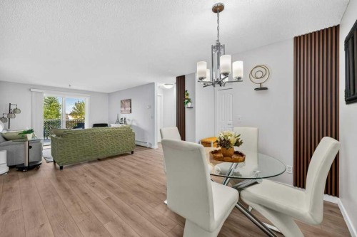 2207-12 Cimarron Common, Okotoks, AB - Indoor Photo Showing Dining Room