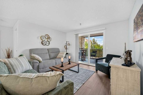 2207-12 Cimarron Common, Okotoks, AB - Indoor Photo Showing Living Room