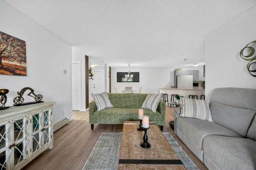 2207-12 Cimarron Common, Okotoks, AB - Indoor Photo Showing Living Room