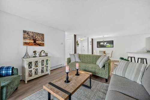 2207-12 Cimarron Common, Okotoks, AB - Indoor Photo Showing Living Room