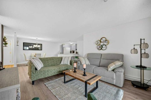 2207-12 Cimarron Common, Okotoks, AB - Indoor Photo Showing Living Room