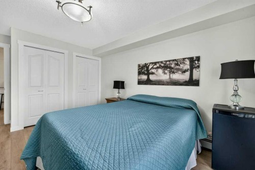 2207-12 Cimarron Common, Okotoks, AB - Indoor Photo Showing Bedroom