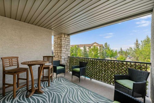 2207-12 Cimarron Common, Okotoks, AB - Outdoor With Deck Patio Veranda With Exterior