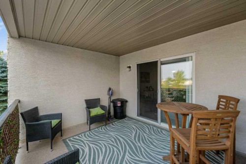 2207-12 Cimarron Common, Okotoks, AB - Outdoor With Deck Patio Veranda With Exterior