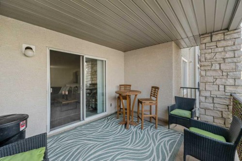 2207-12 Cimarron Common, Okotoks, AB - Outdoor With Deck Patio Veranda With Exterior