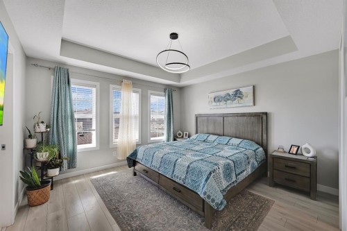 1265 Carrington Boulevard Nw, Calgary, AB - Indoor Photo Showing Bedroom