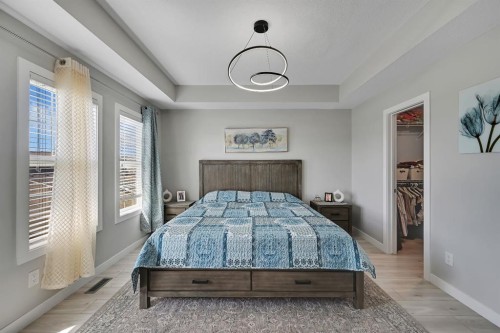 1265 Carrington Boulevard Nw, Calgary, AB - Indoor Photo Showing Bedroom