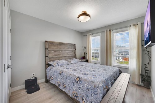1265 Carrington Boulevard Nw, Calgary, AB - Indoor Photo Showing Bedroom