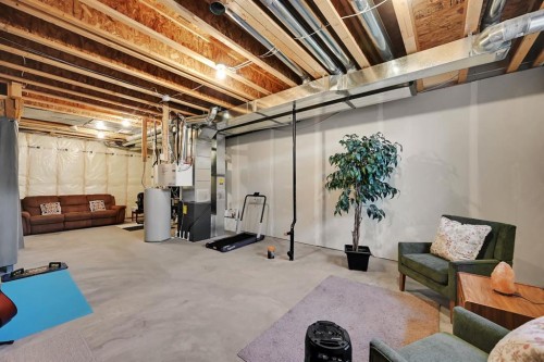 1265 Carrington Boulevard Nw, Calgary, AB - Indoor Photo Showing Basement
