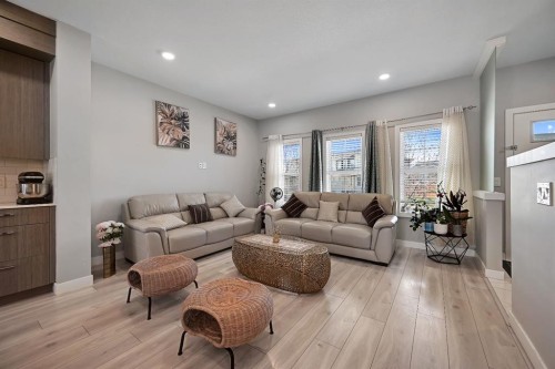 1265 Carrington Boulevard Nw, Calgary, AB - Indoor Photo Showing Living Room