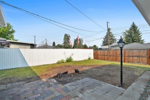 9743 Academy Drive Se, Calgary, AB - Outdoor With Backyard