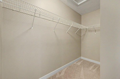 64 Copperpond Terrace Se, Calgary, AB - Indoor With Storage