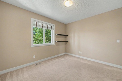 64 Copperpond Terrace Se, Calgary, AB - Indoor Photo Showing Other Room