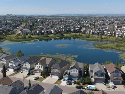 64 Copperpond Terrace Se, Calgary, AB - Outdoor With Body Of Water With View