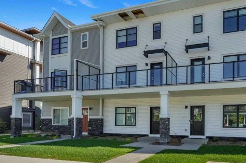 693 Savanna Boulevard Ne, Calgary, AB - Outdoor With Balcony With Facade